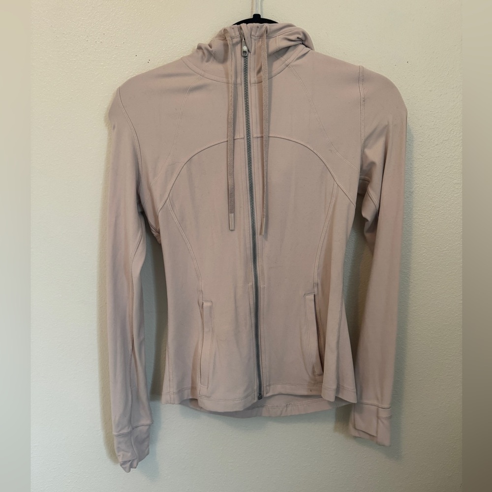 Define hooded jacket in soft pink